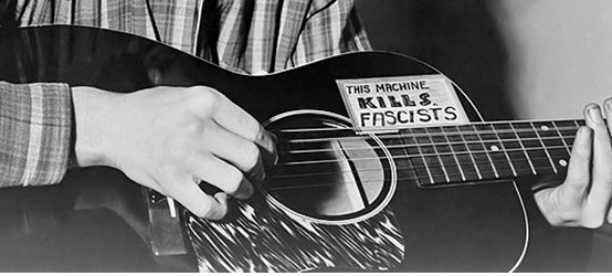 Woody Guthrie's guitar Pictures, Images and Photos