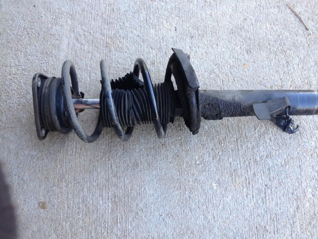 Strut spring compressor in action.