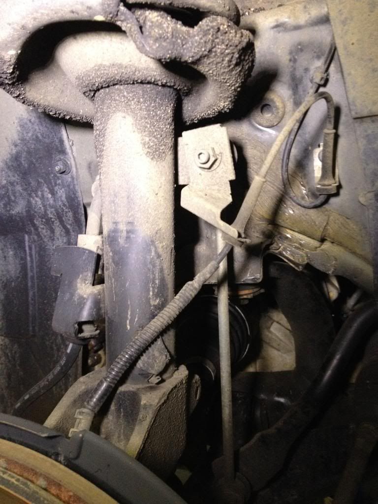 I removed this bracket which holds an abs sensor wire and a stabilizer rod.